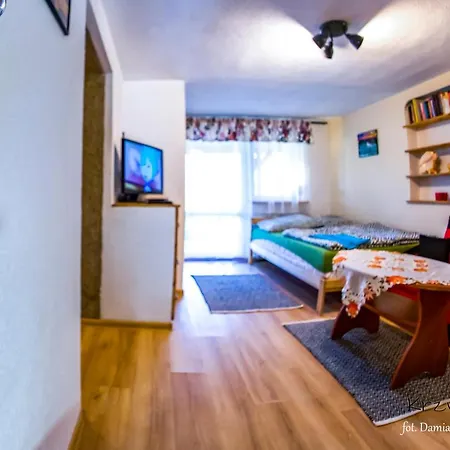 Pod Krzywym Dachem *