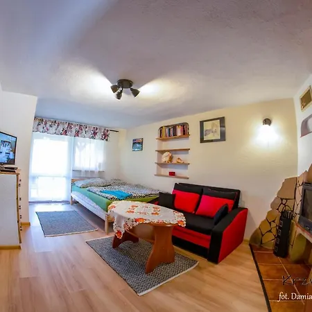 Pod Krzywym Dachem Деревянный коттедж Karpniki